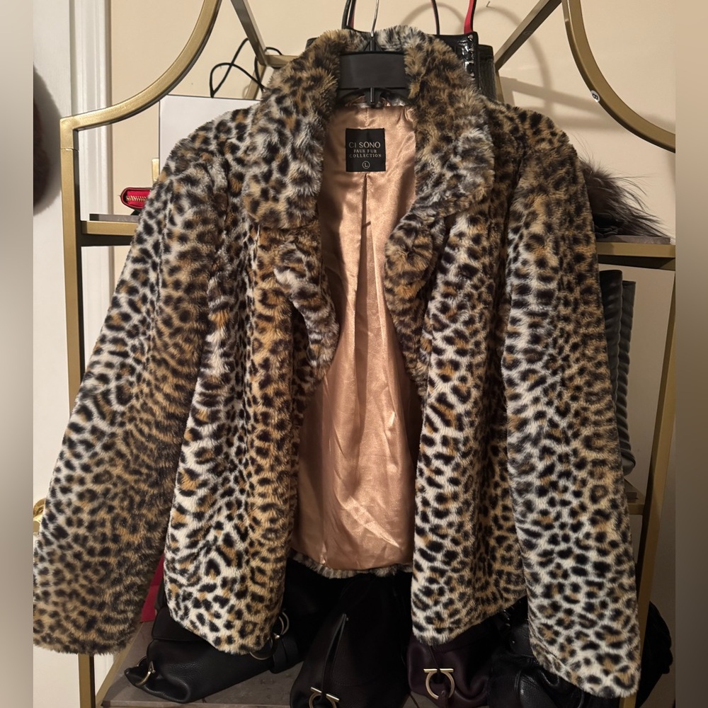 Like new faux fur jacket.